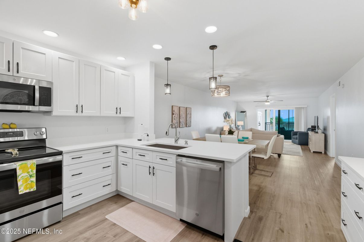 Dining room, Interior, Kitchen, Living room, Pendant Lights, Recessed Lighting, Stainless Steel Appliances, Wood Texture Flooring