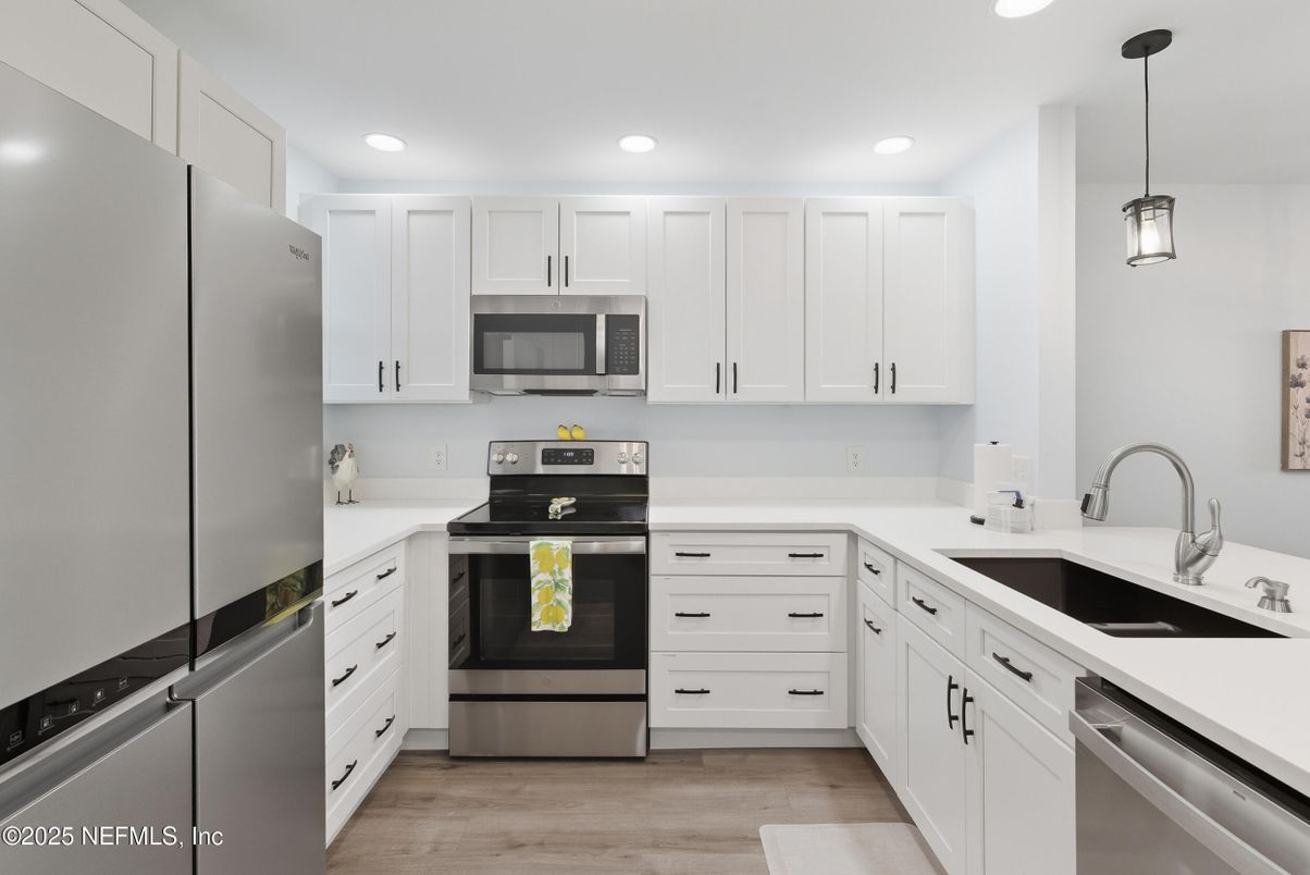 Interior, Kitchen, Pendant Lights, Recessed Lighting, Stainless Steel Appliances, Wood Texture Flooring