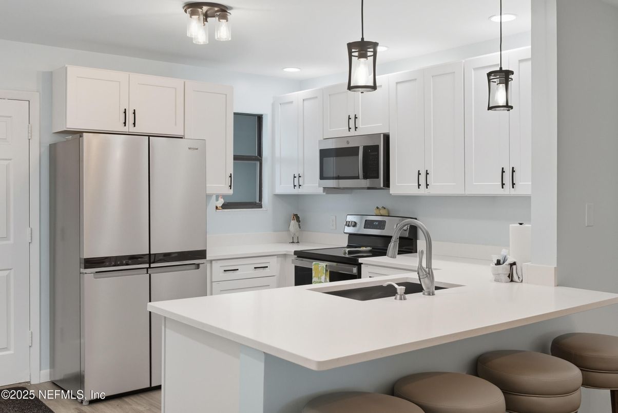 Interior, Kitchen, Pendant Lights, Recessed Lighting, Stainless Steel Appliances, Wood Texture Flooring