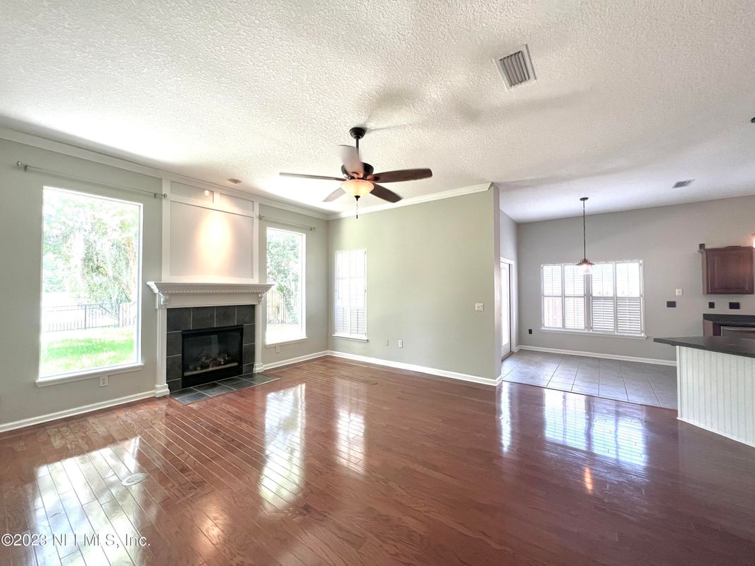 Empty room, Fireplace, Interior, Pendant Lights, Wood Texture Flooring