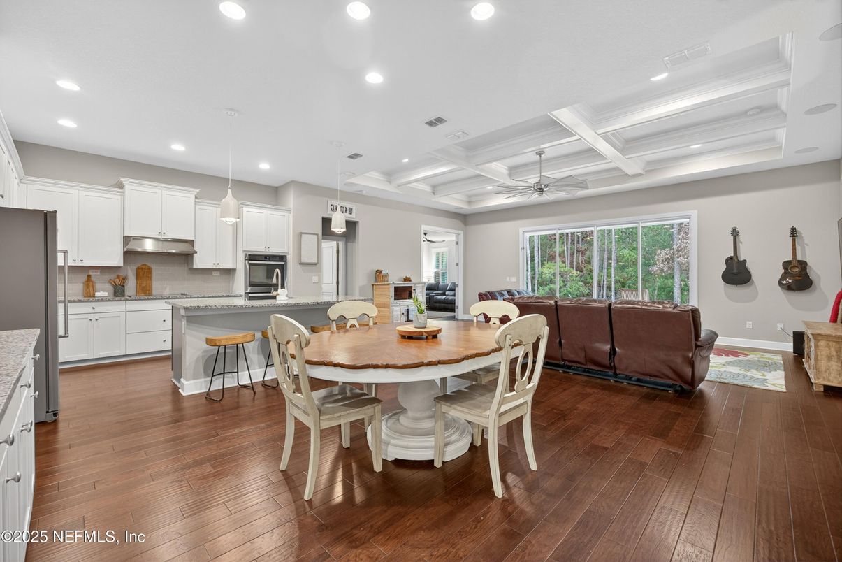 Dining room, Interior, Kitchen, Living room, Pendant Lights, Recessed Lighting, Stainless Steel Appliances, Wood Texture Flooring