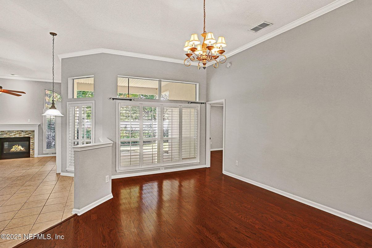 Chandelier, Empty room, Fireplace, Interior, Pendant Lights, Wood Texture Flooring