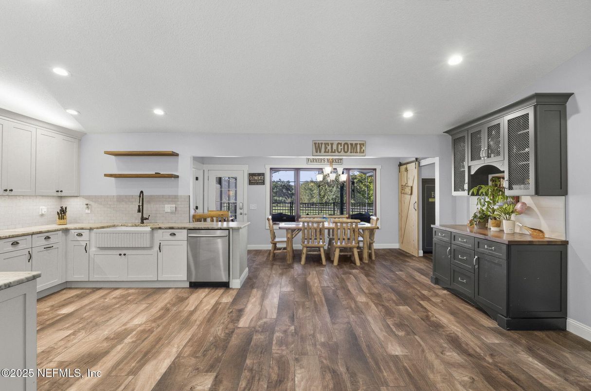 Dining room, Interior, Kitchen, Recessed Lighting, Stainless Steel Appliances, Wood Texture Flooring