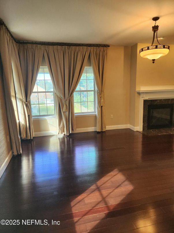 Empty room, Fireplace, Interior, Pendant Lights, Wood Texture Flooring
