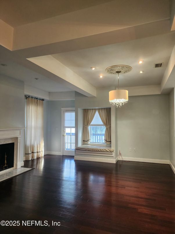Chandelier, Empty room, Fireplace, Interior, Recessed Lighting, Wood Texture Flooring