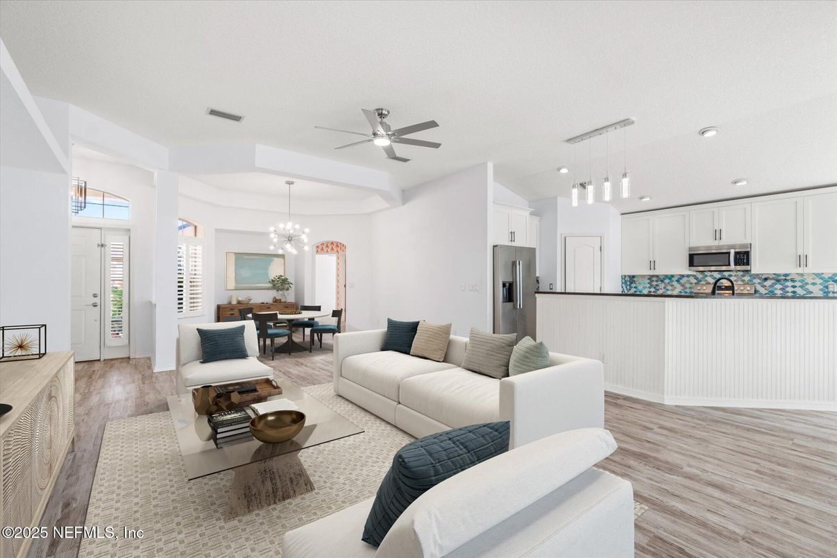 Chandelier, Dining room, Interior, Kitchen, Living room, Pendant Lights, Recessed Lighting, Stainless Steel Appliances, Wood Texture Flooring