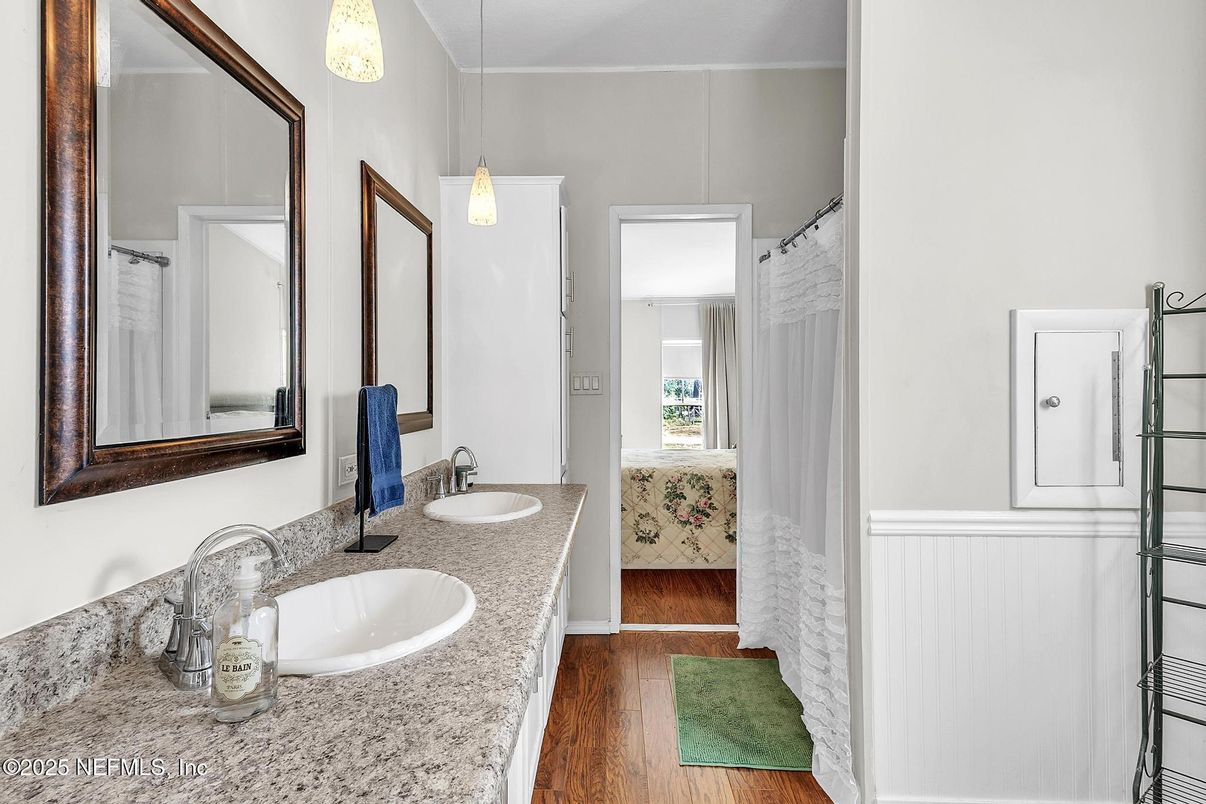 Bathroom, Dual Sink Vanities, Interior, Pendant Lights, Wood Texture Flooring
