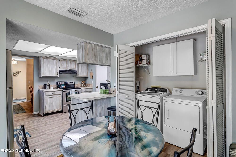 Interior, Kitchen, Utility Closets, Washer, Wood Texture Flooring