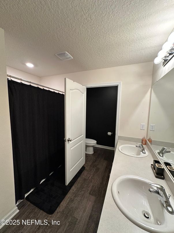 Bathroom, Dual Sink Vanities, Interior, Recessed Lighting, Wood Texture Flooring
