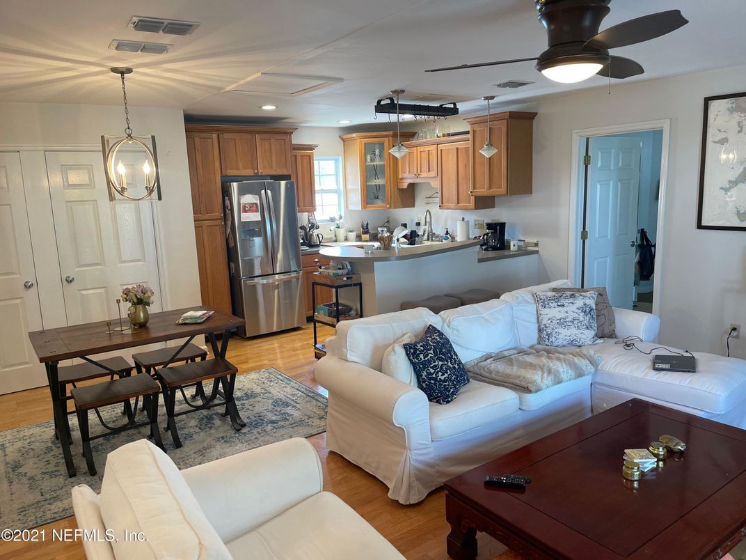 Dining room, Interior, Kitchen, Living room, Pendant Lights, Recessed Lighting, Stainless Steel Appliances, Wood Texture Flooring