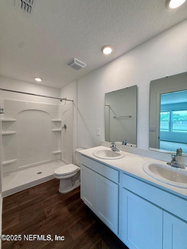 Bathroom, Dual Sink Vanities, Interior, Recessed Lighting, Wood Texture Flooring