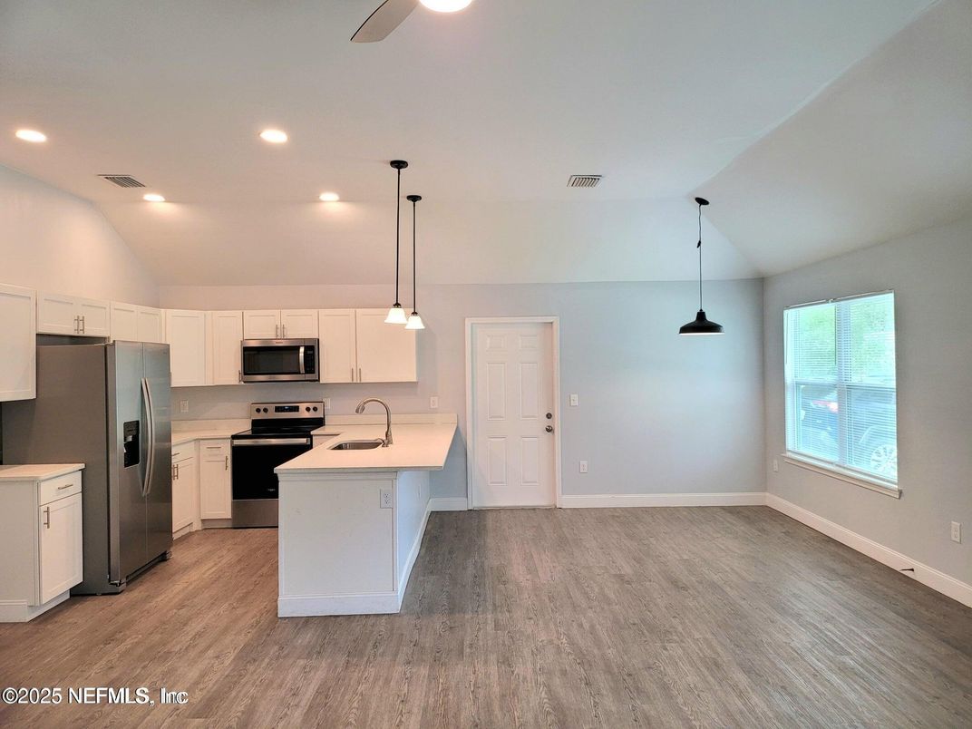 Interior, Kitchen, Pendant Lights, Recessed Lighting, Stainless Steel Appliances, Wood Texture Flooring