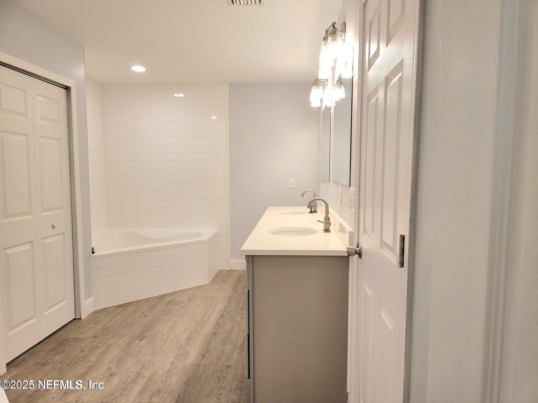Bathroom, Dual Sink Vanities, Interior, Recessed Lighting, Wood Texture Flooring