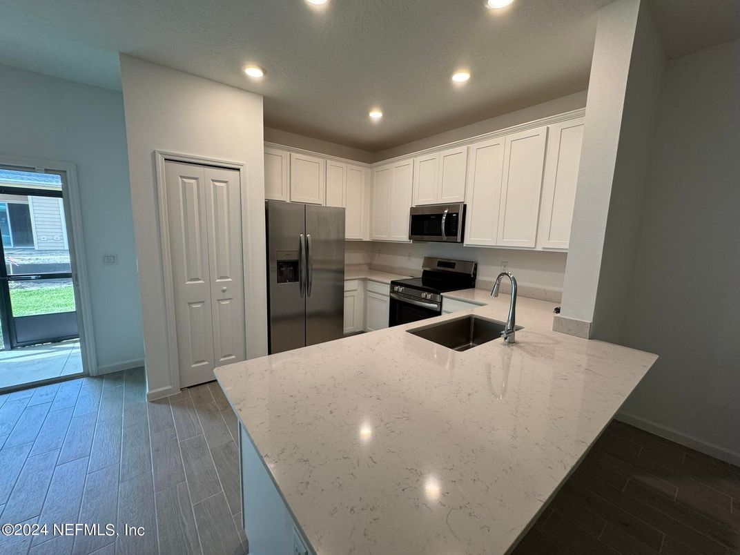 Interior, Kitchen, Recessed Lighting, Stainless Steel Appliances, Wood Texture Flooring