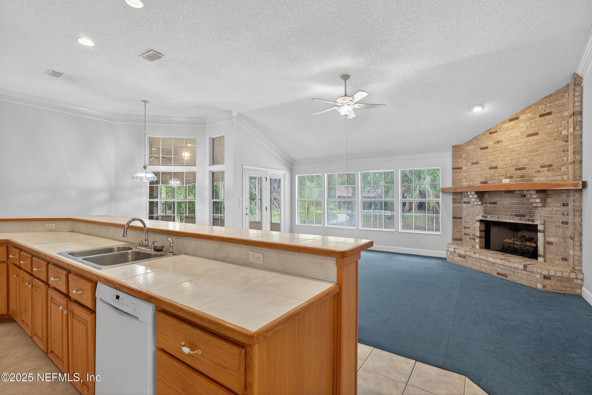 Fireplace, Interior, Kitchen, Pendant Lights, Recessed Lighting, Stone Walls