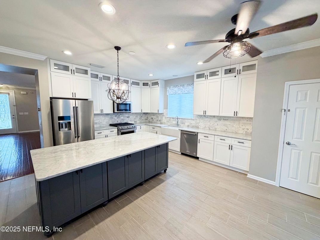 Interior, Kitchen, Pendant Lights, Recessed Lighting, Stainless Steel Appliances, Wood Texture Flooring