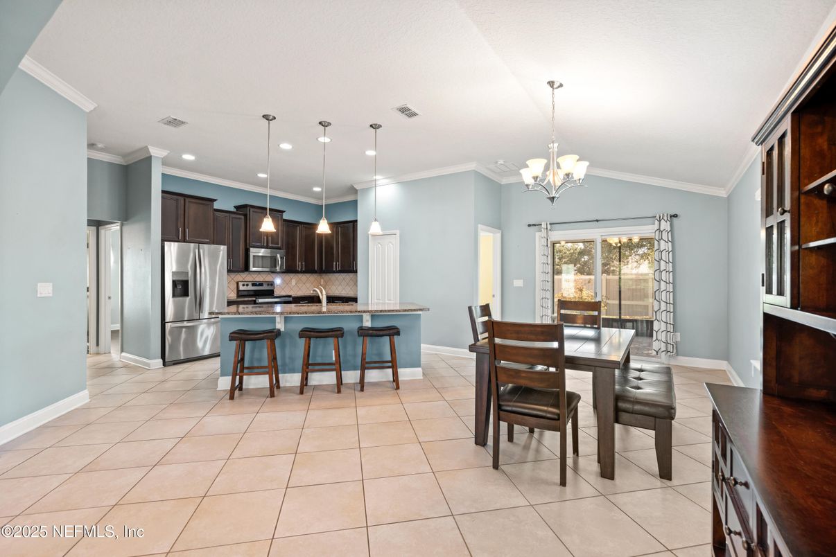 Chandelier, Dining room, Interior, Kitchen, Pendant Lights, Recessed Lighting, Stainless Steel Appliances