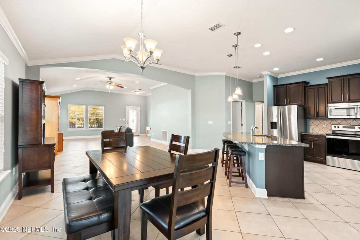 Chandelier, Dining room, Interior, Kitchen, Pendant Lights, Recessed Lighting, Stainless Steel Appliances