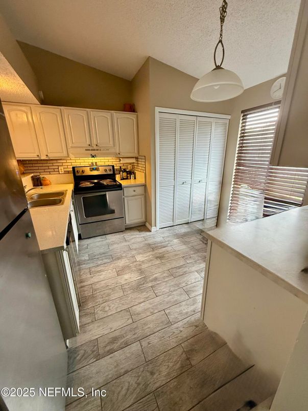 Interior, Kitchen, Pendant Lights, Stainless Steel Appliances, Wood Texture Flooring
