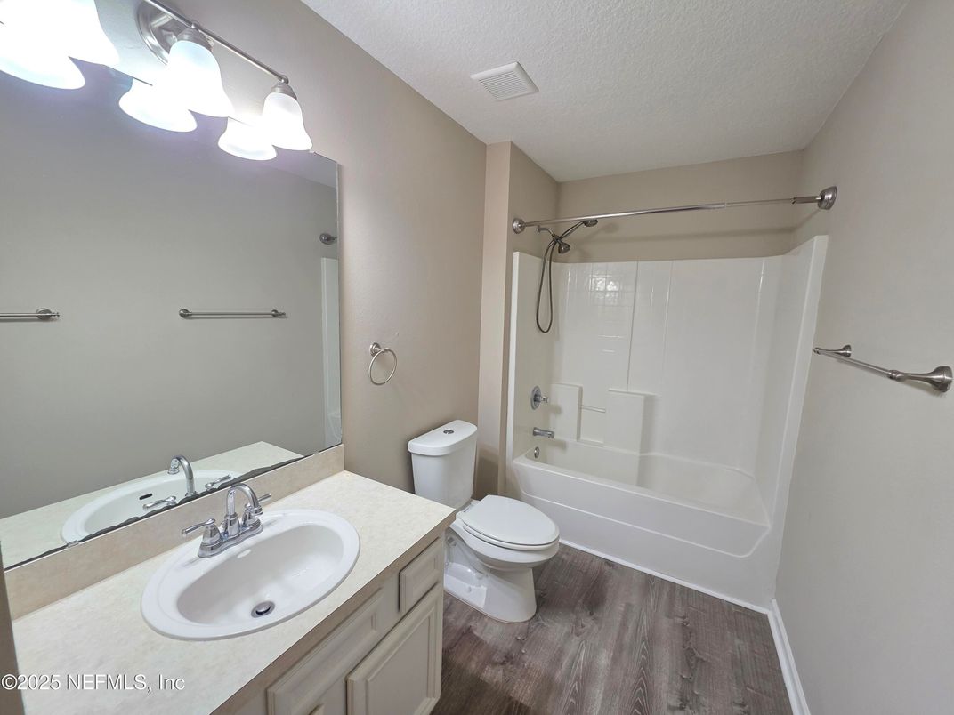 Bathroom, Dual Sink Vanities, Glass Shower, Interior, Wood Texture Flooring