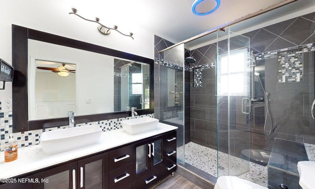 Bathroom, Dual Sink Vanities, Glass Shower, Interior, Wood Texture Flooring