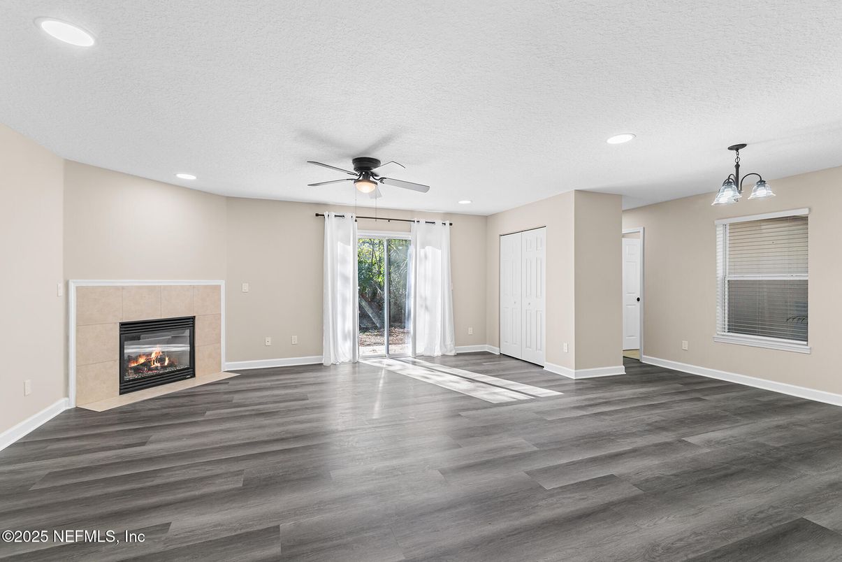 Empty room, Fireplace, Interior, Pendant Lights, Recessed Lighting, Wood Texture Flooring