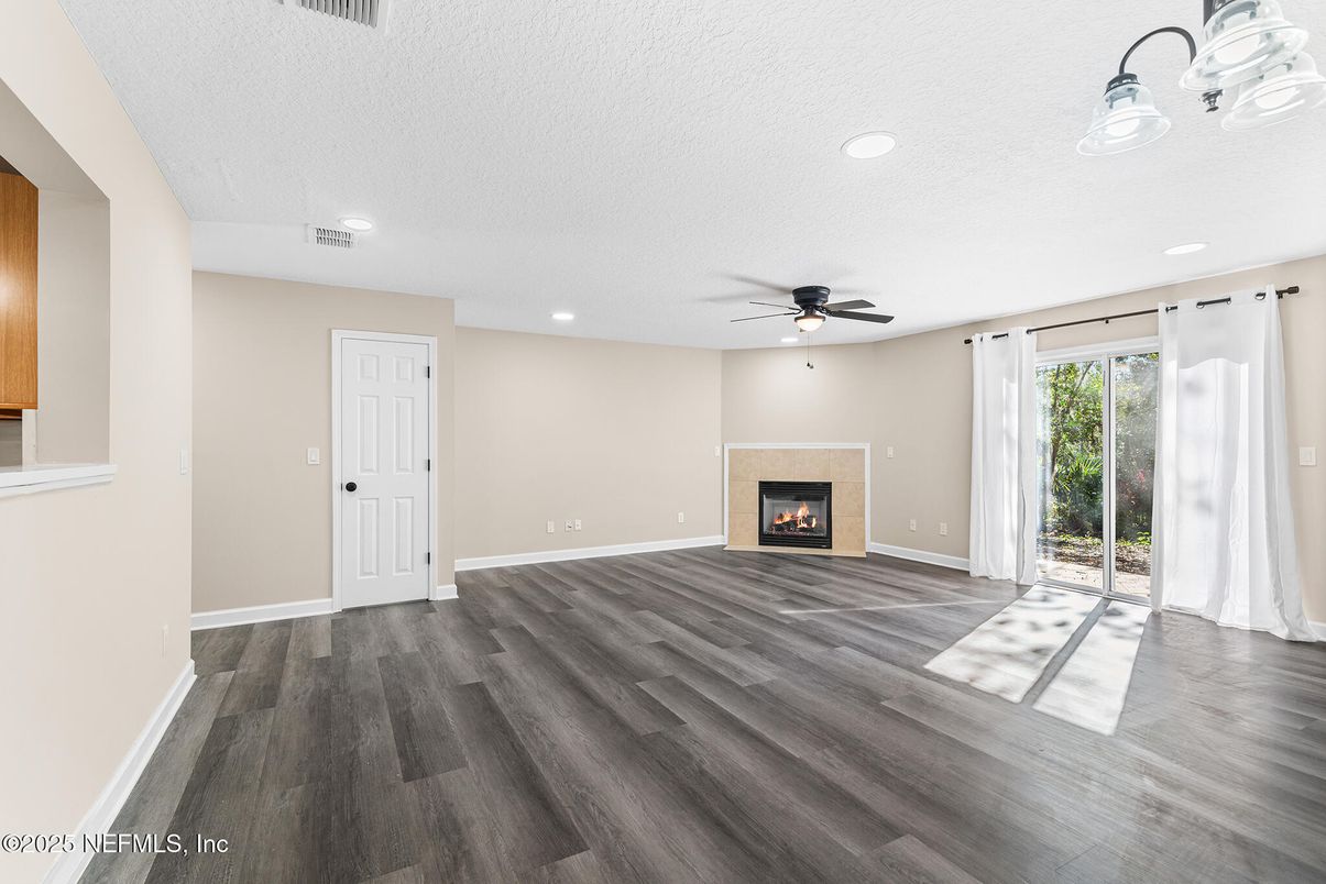Empty room, Fireplace, Interior, Recessed Lighting, Wood Texture Flooring