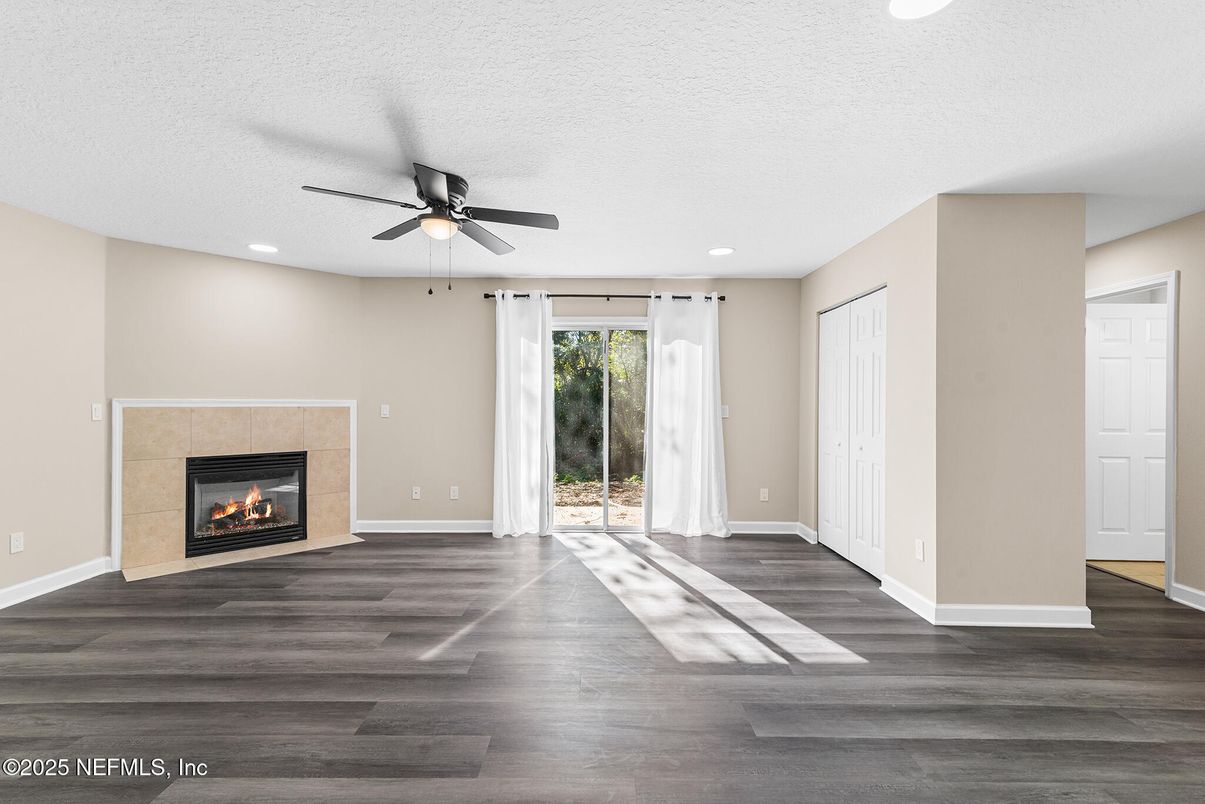 Empty room, Fireplace, Interior, Recessed Lighting, Wood Texture Flooring