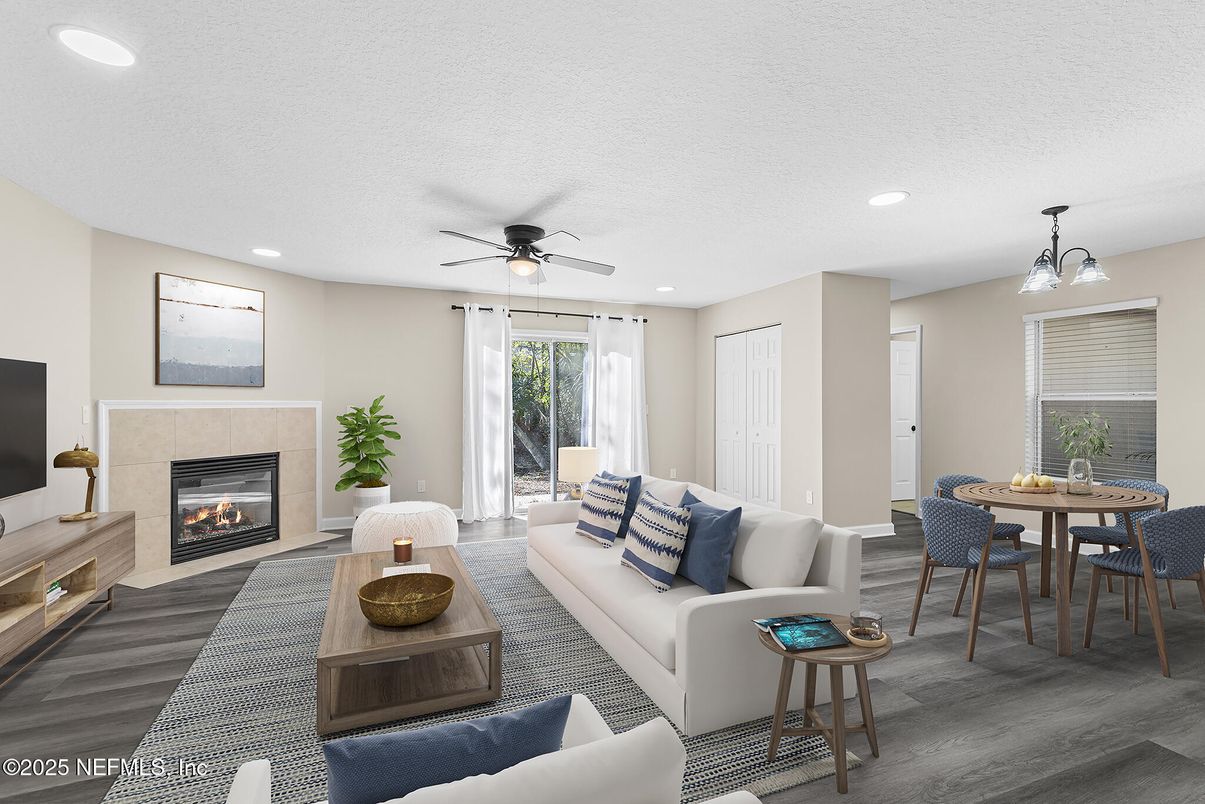 Dining room, Fireplace, Interior, Living room, Pendant Lights, Recessed Lighting, Wood Texture Flooring