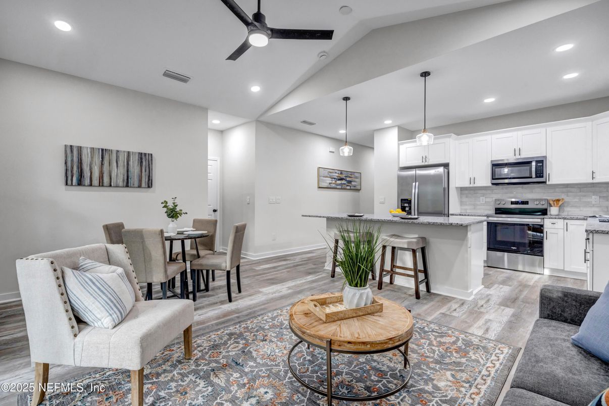 Dining room, Interior, Kitchen, Pendant Lights, Recessed Lighting, Stainless Steel Appliances, Wood Texture Flooring