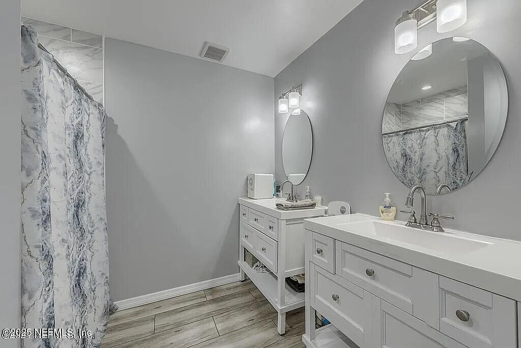 Bathroom, Dual Sink Vanities, Interior, Recessed Lighting, Wood Texture Flooring