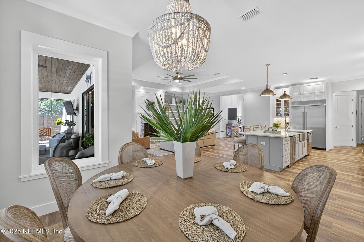 Chandelier, Dining room, Interior, Kitchen, Pendant Lights, Recessed Lighting, Stainless Steel Appliances, Wood Texture Flooring