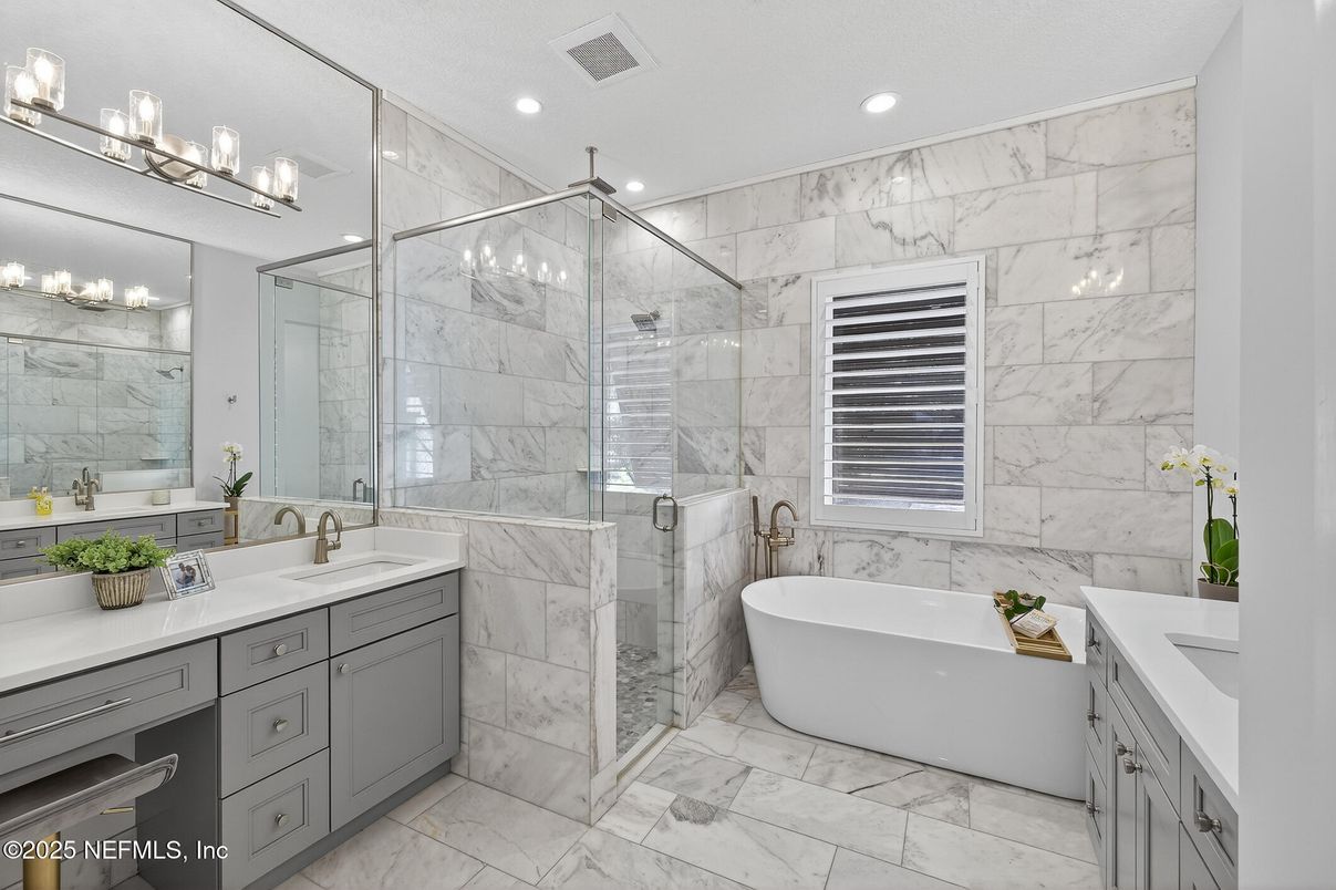 Bathroom, Dual Sink Vanities, Free Standing Baths, Glass Shower, Interior, Marble, Marble Walls, Recessed Lighting
