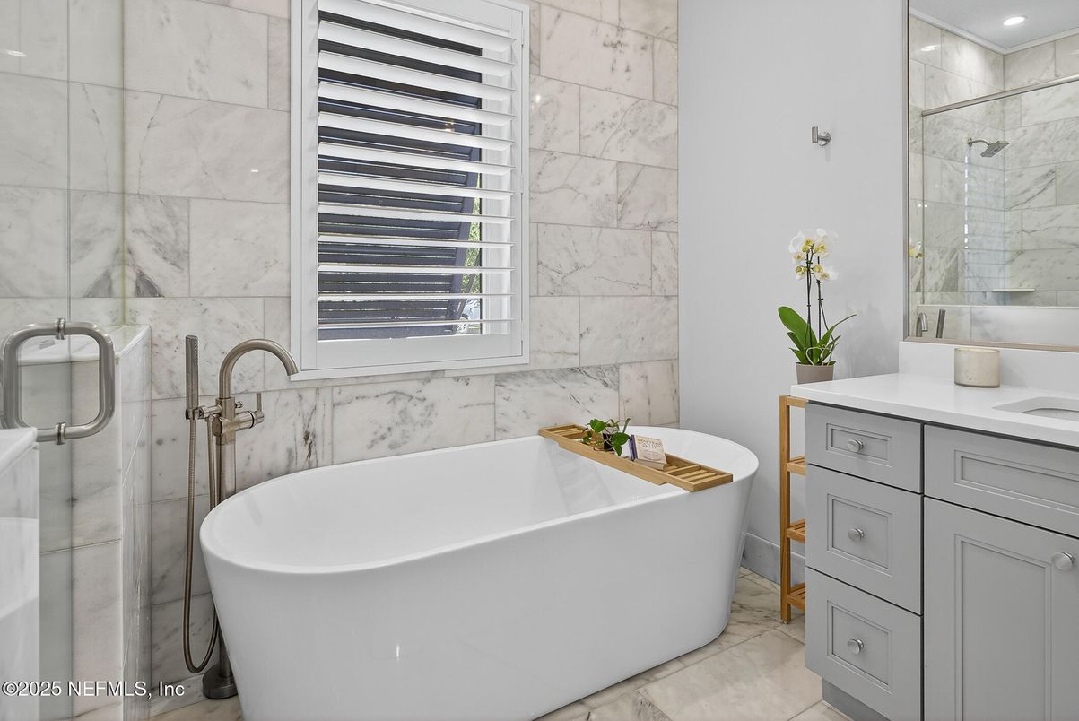 Bathroom, Free Standing Baths, Glass Shower, Interior, Marble, Marble Walls, Recessed Lighting