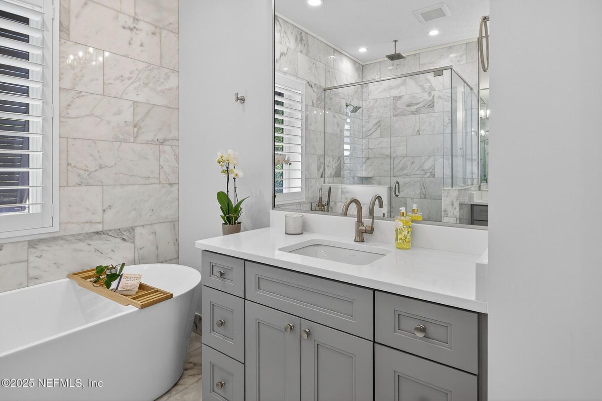 Bathroom, Dual Sink Vanities, Free Standing Baths, Glass Shower, Interior, Marble Walls, Recessed Lighting