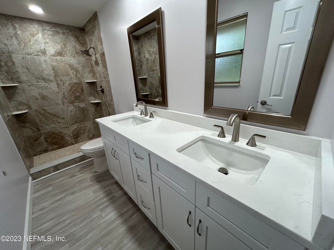 Bathroom, Dual Sink Vanities, Interior, Recessed Lighting, Wood Texture Flooring