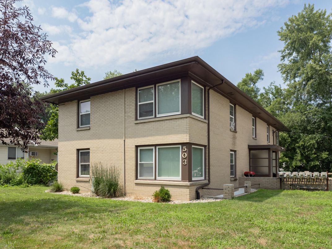 Attached, Exterior, Facade, Brick Facade, Modern