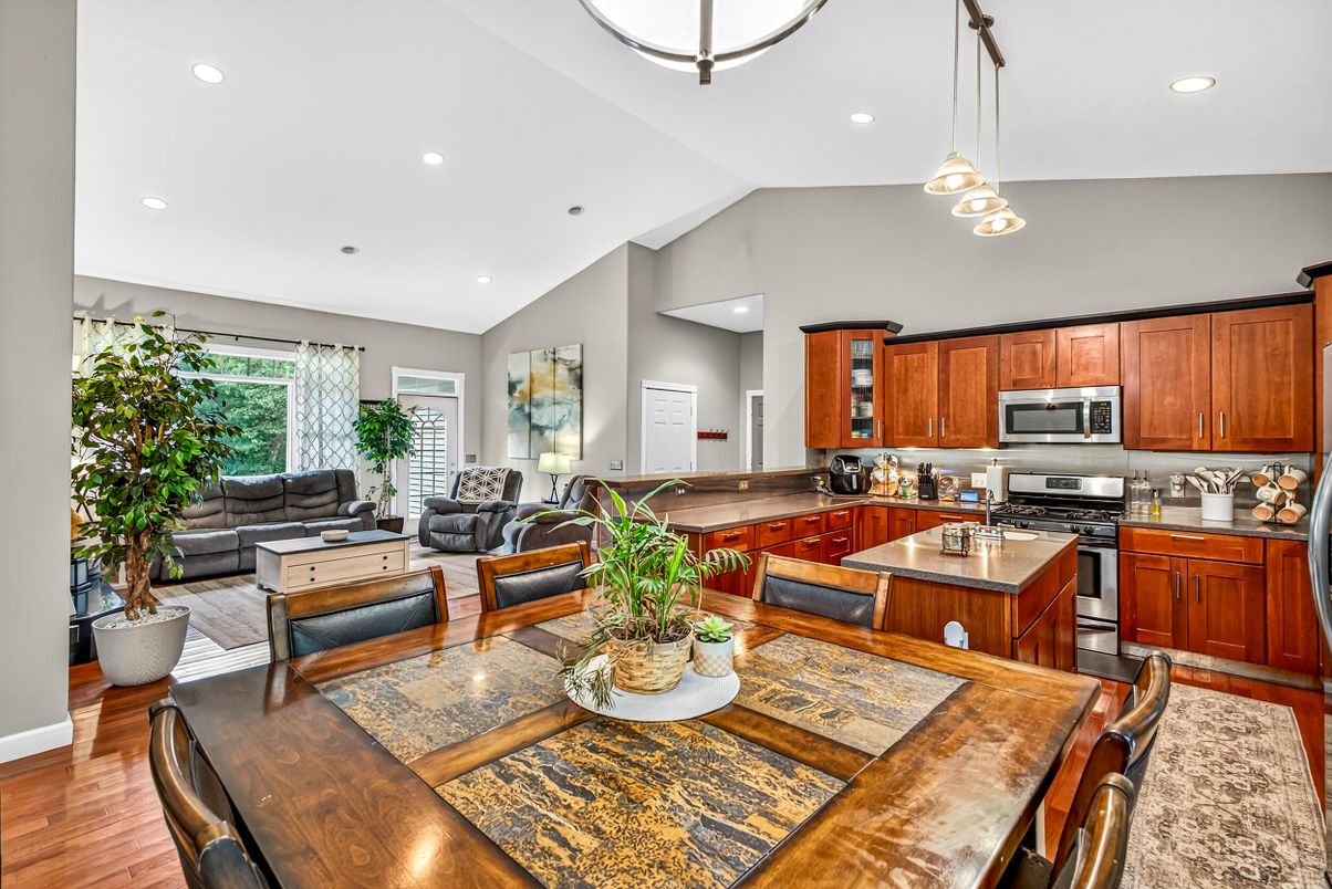 Dining room, Interior, Kitchen, Living room, Pendant Lights, Recessed Lighting, Stainless Steel Appliances, Wood Texture Flooring