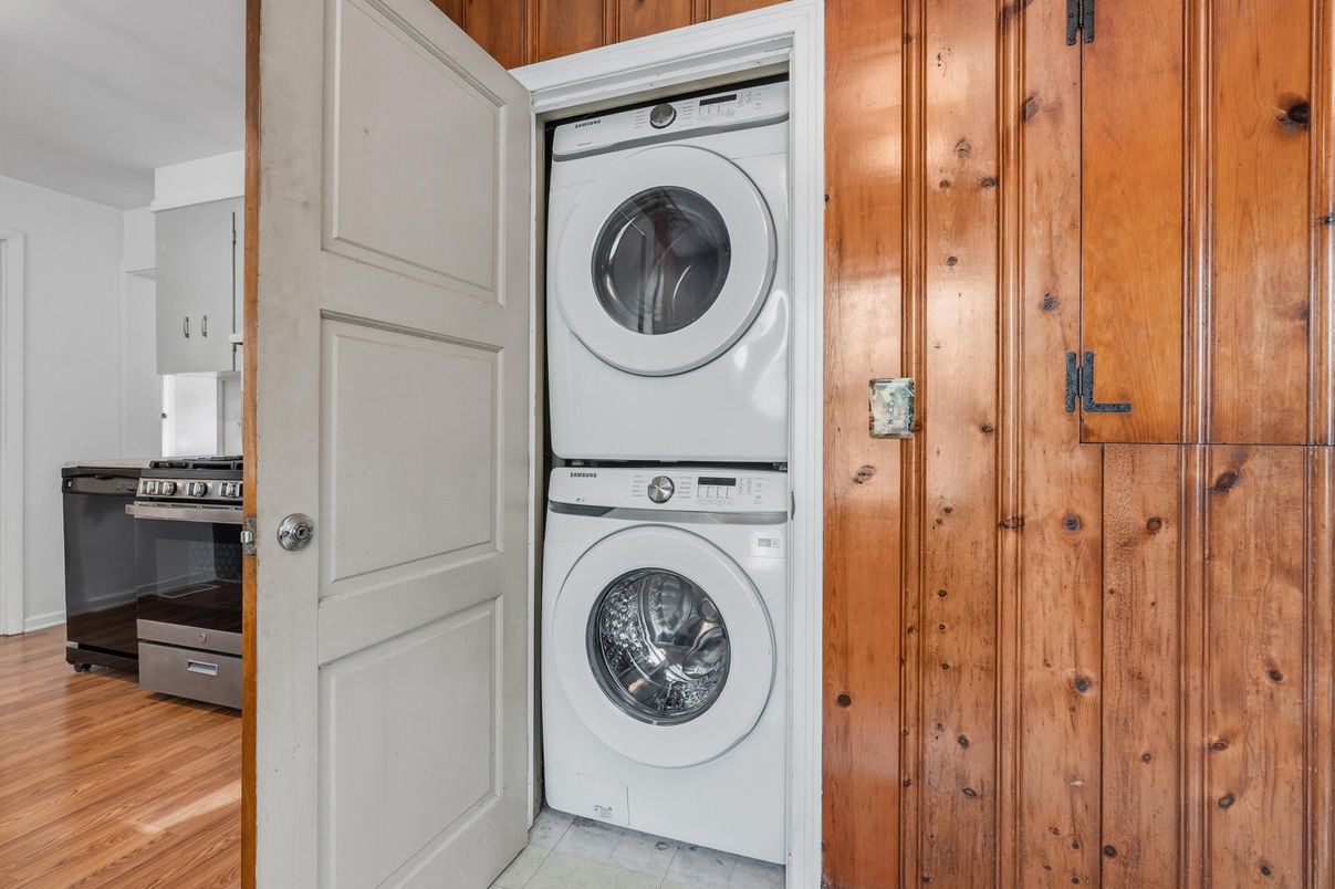 Interior, Utility Closets, Washer, Wood Texture Flooring, Wooden Walls