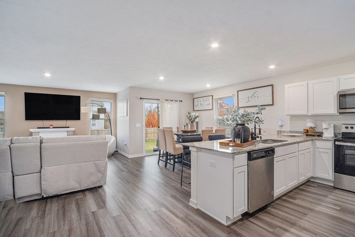 Dining room, Interior, Kitchen, Living room, Recessed Lighting, Stainless Steel Appliances, Wood Texture Flooring