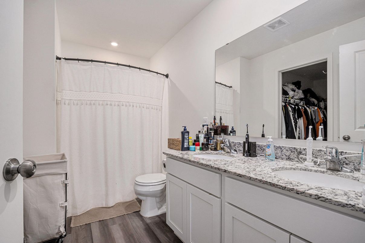 Bathroom, Dual Sink Vanities, Interior, Recessed Lighting, Wood Texture Flooring