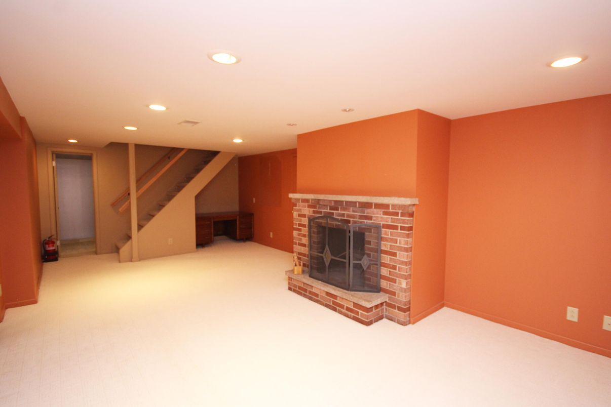 Empty room, Fireplace, Interior, Recessed Lighting, Wooden Beams
