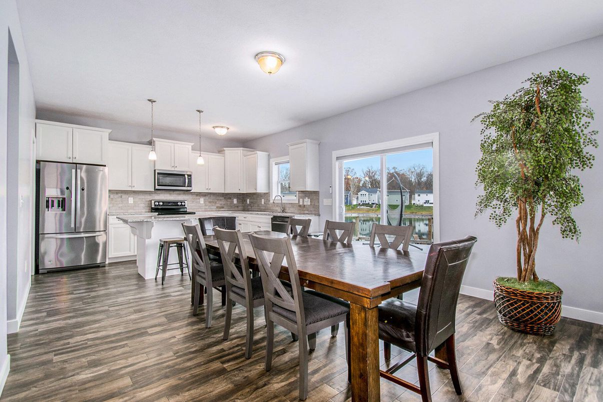 Dining room, Interior, Kitchen, Pendant Lights, Stainless Steel Appliances, Wood Texture Flooring