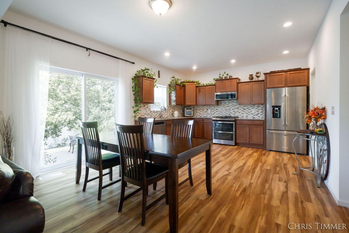 Dining room, Interior, Kitchen, Recessed Lighting, Stainless Steel Appliances, Wood Texture Flooring