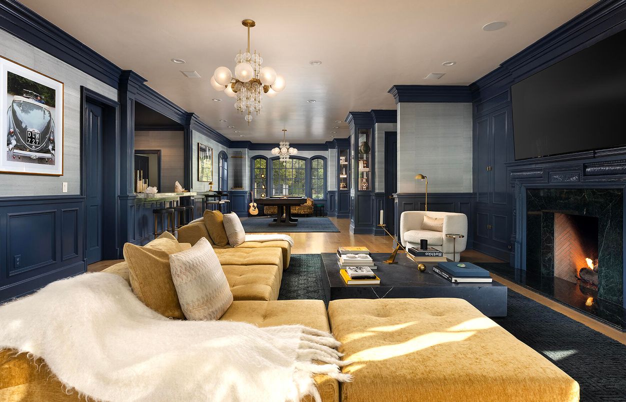 Billiard Table, Chandelier, Fireplace, Game Room, Interior, Living room, Pendant Lights, Recessed Lighting, Wood Texture Flooring