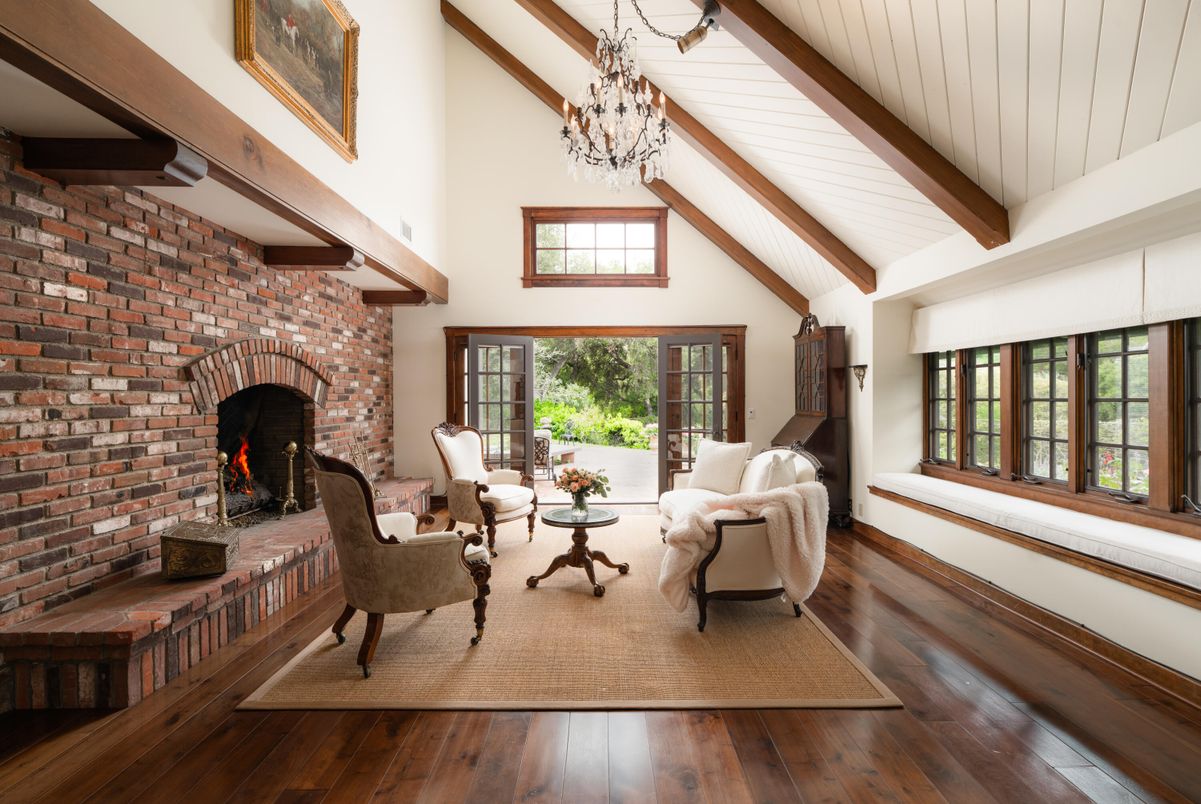 Chandelier, Fireplace, Interior, Living room, Stone Walls, Wooden Beams, Wood Texture Flooring