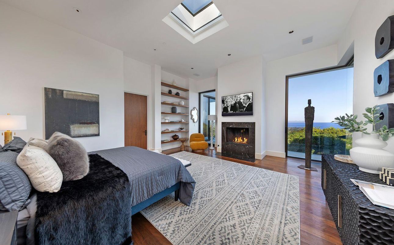 Bedroom, Fireplace, Interior, Recessed Lighting, Water, Wood Texture Flooring