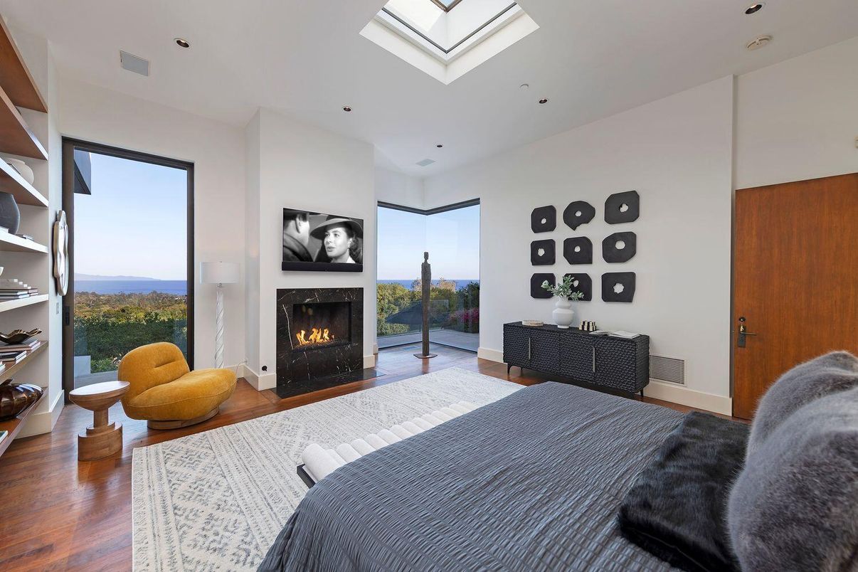 Bedroom, Fireplace, Interior, Recessed Lighting, Water, Wood Texture Flooring