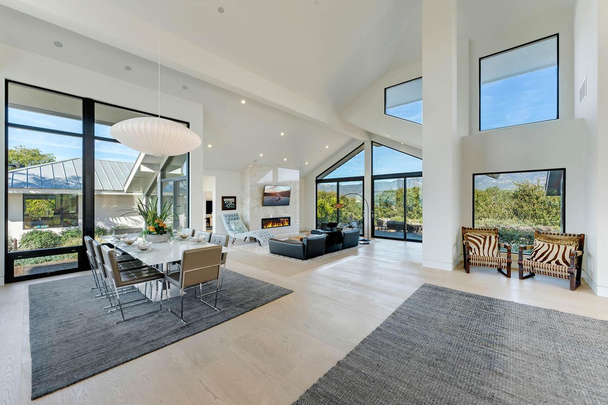 Dining room, Fireplace, Glass Ceilings, Interior, Living room, Pendant Lights, Recessed Lighting, Sun Room, Wood Texture Flooring