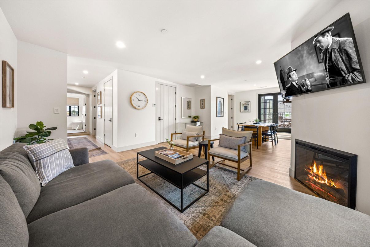 Dining room, Fireplace, Interior, Living room, Recessed Lighting, Wood Texture Flooring